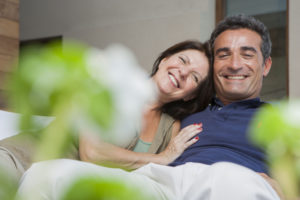 Happy senior couple on the couch
