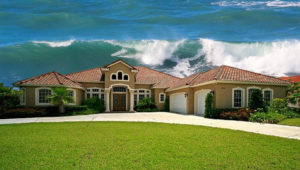 Waves coming over the top of a home